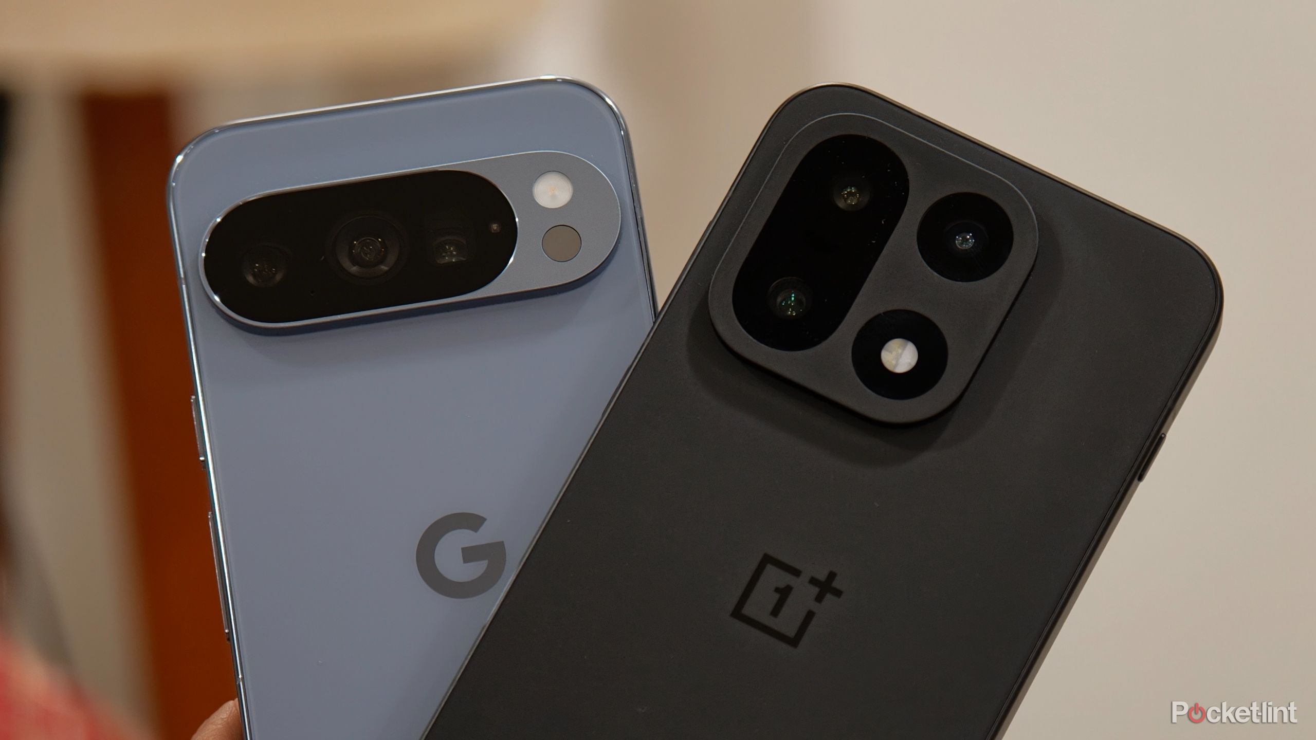 OnePlus 15 and Pixel 10 Pro in hand