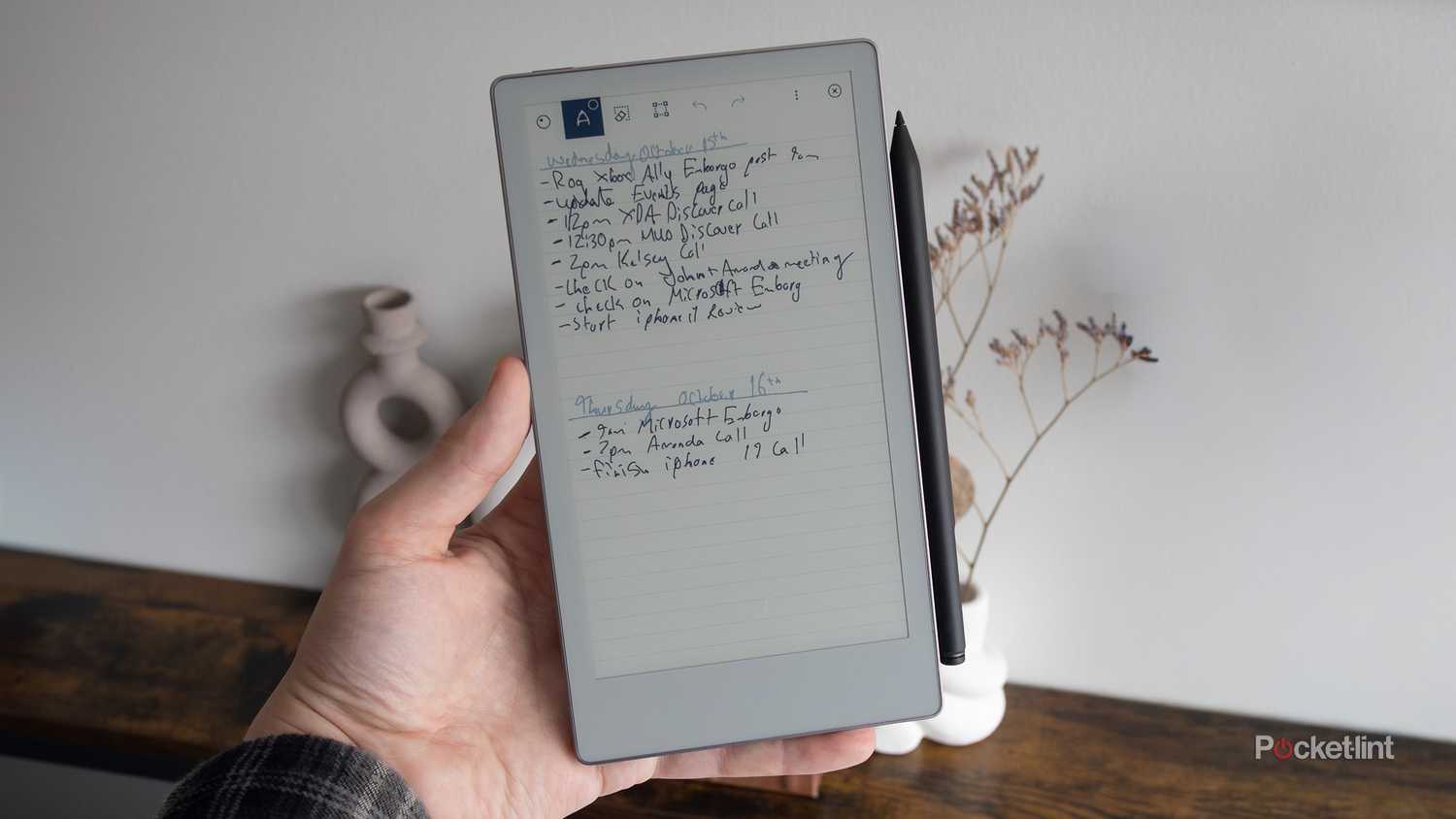 The reMarkable Paper Pro Move being held