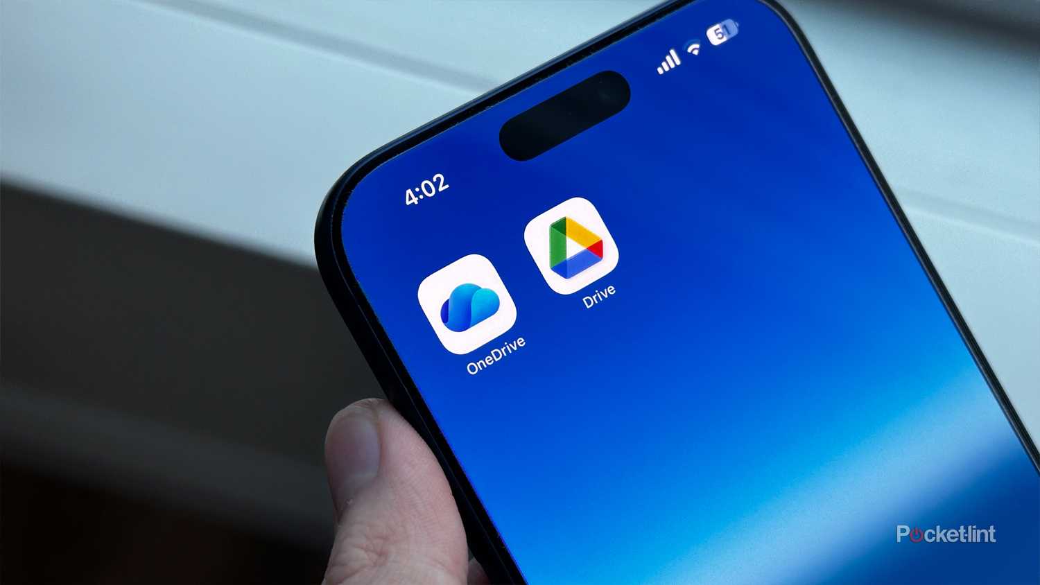 OneDrive and Google Drive apps on iPhone.