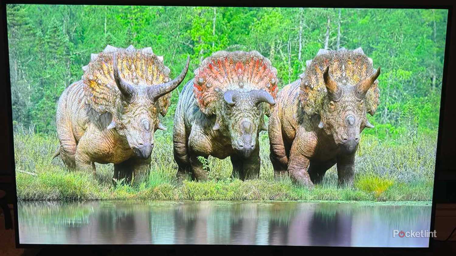 Dinosaurs on Apple TV show displayed on LG QNED85 smart TV