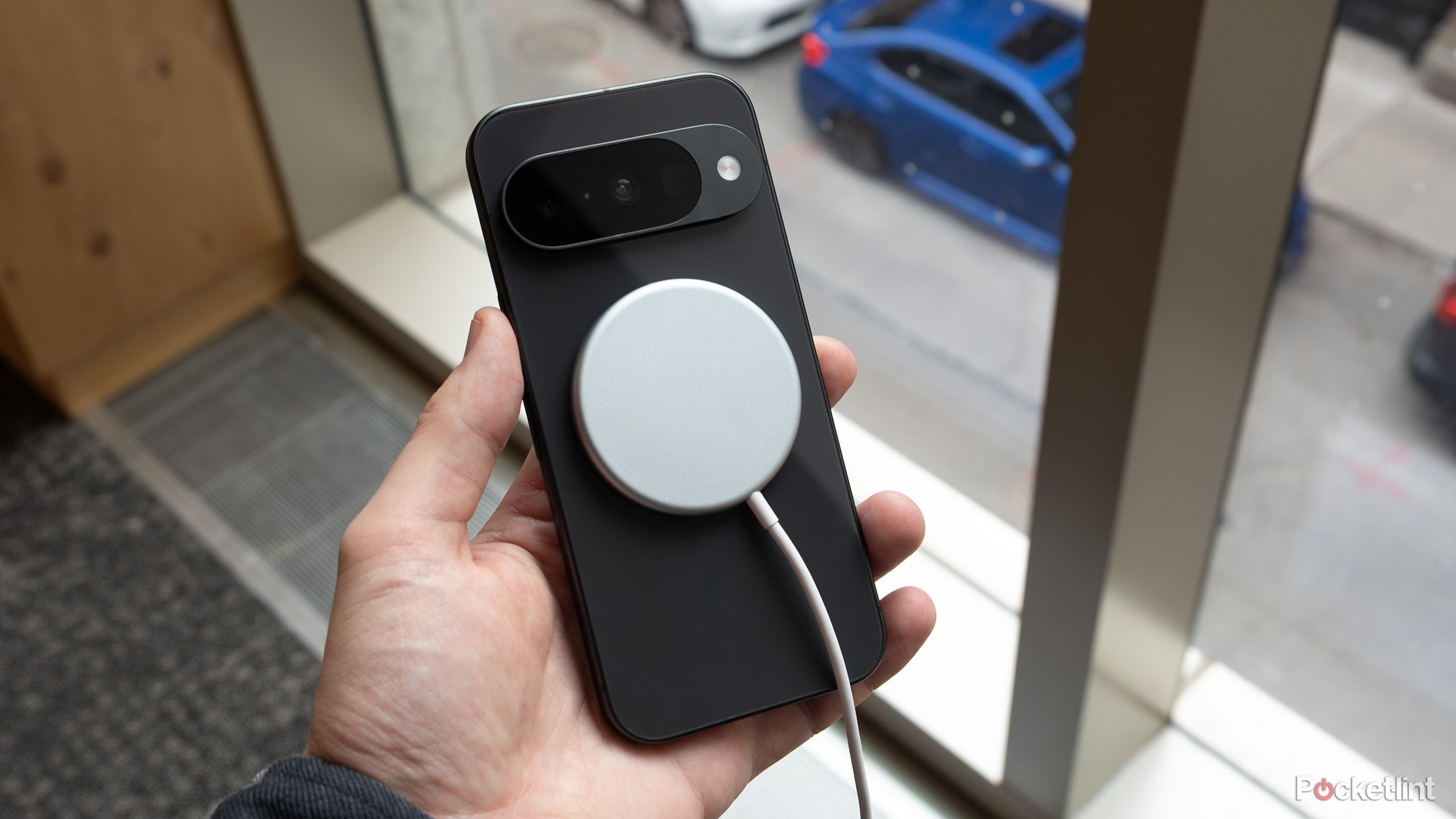 Google Pixelsnap charger on a Pixel 10 smartphone.