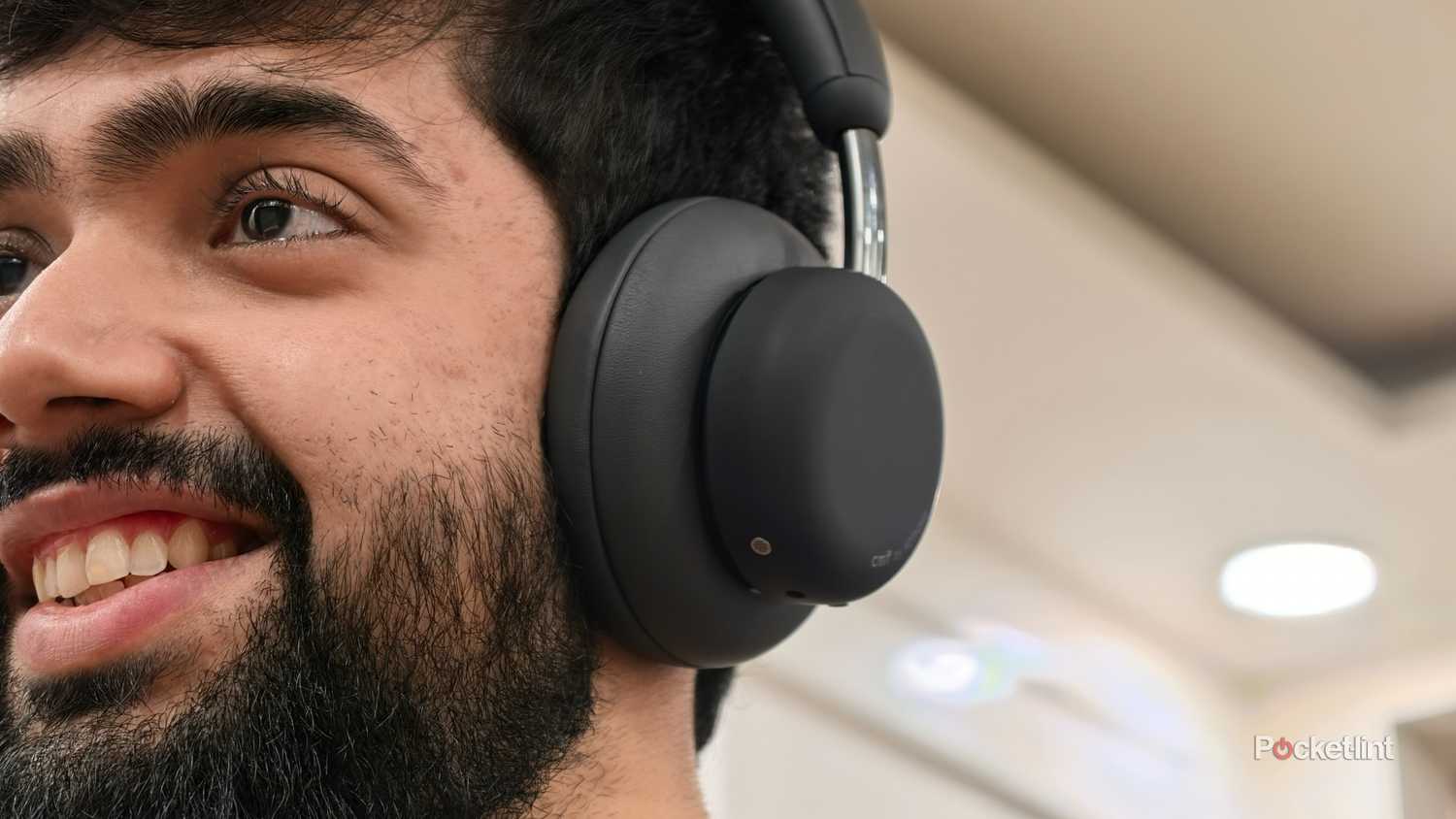Close up shot of the author wearing the CMF Headphones Pro