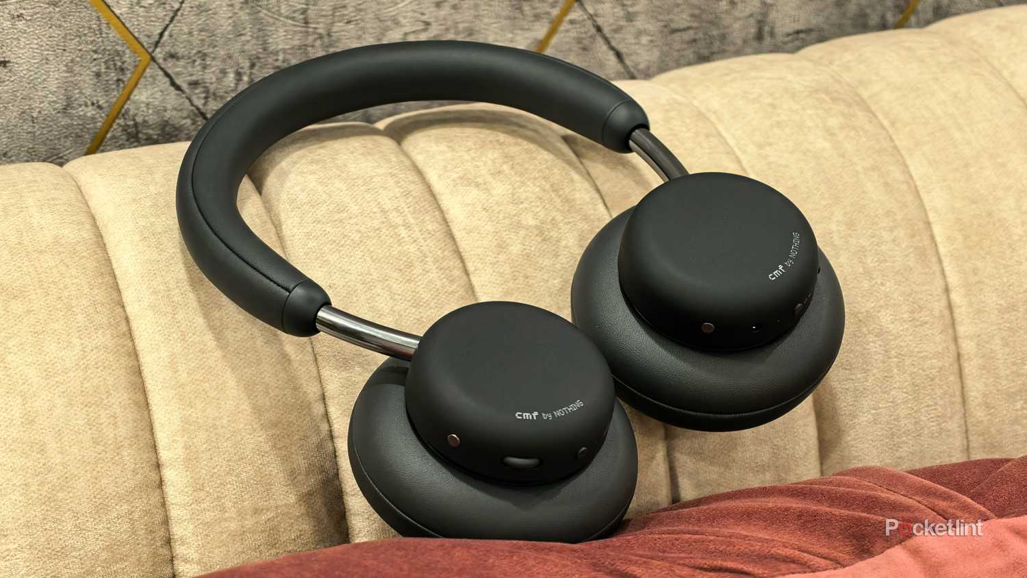 CMF Headphones Pro on a sofa