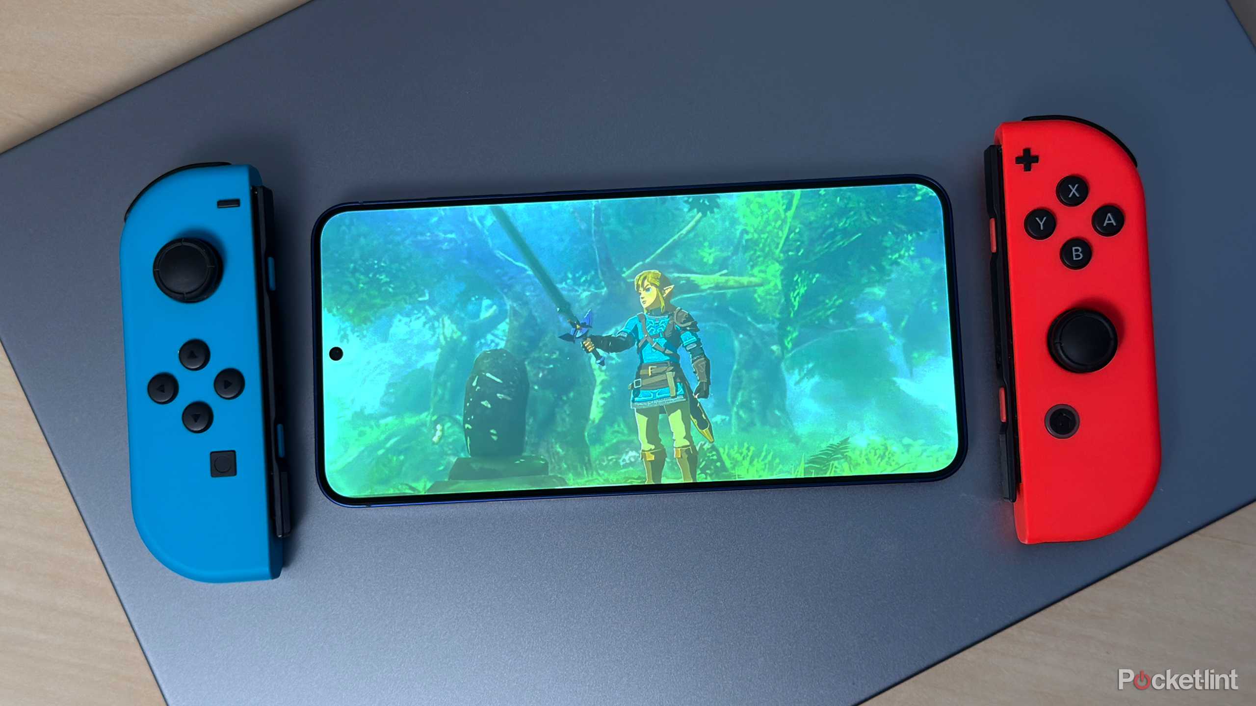 Android phone next to JoyCons.