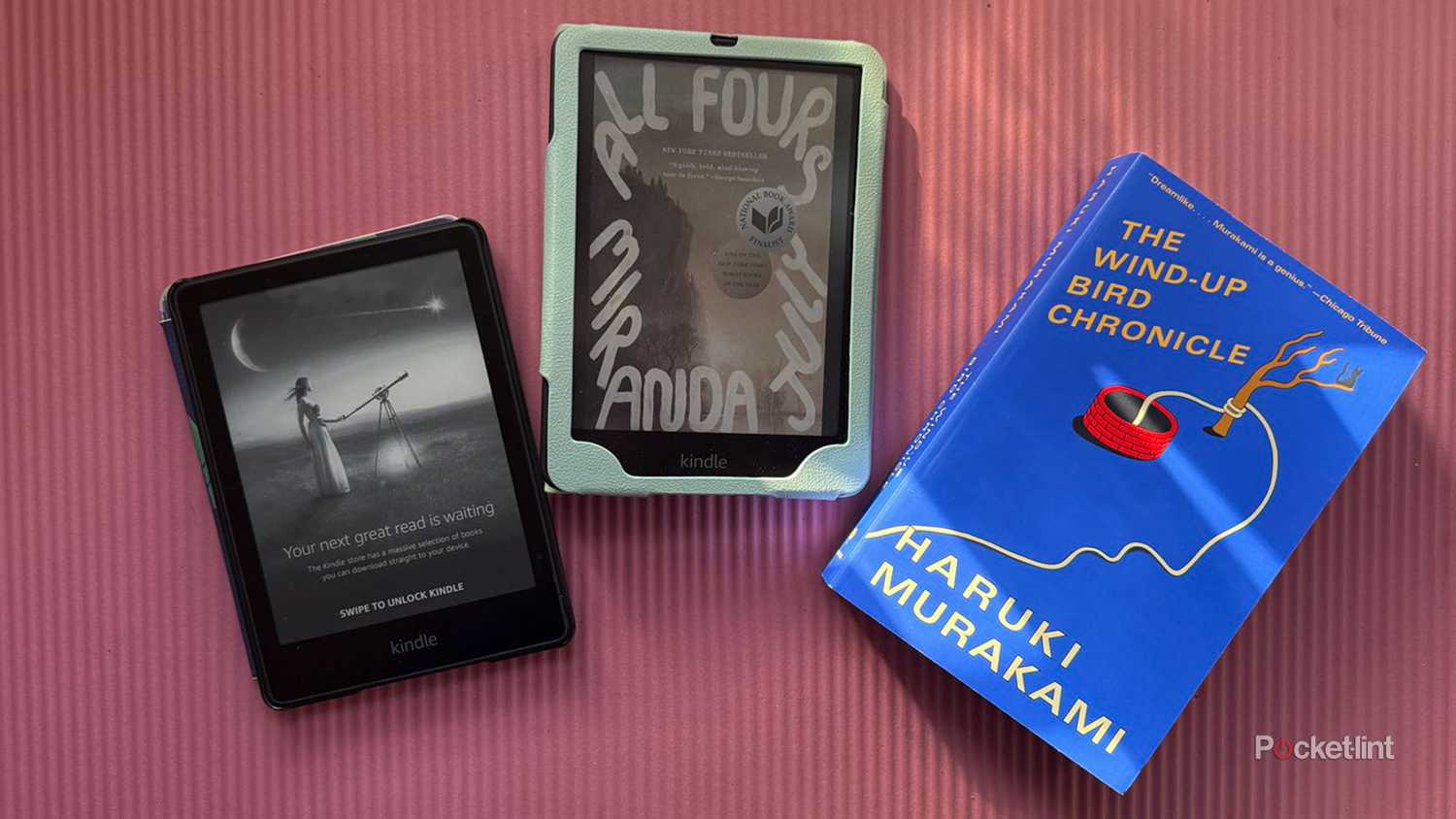 Kindle Paperwhite, Kindle Colorsoft, and physical book by Murakami next facing up.