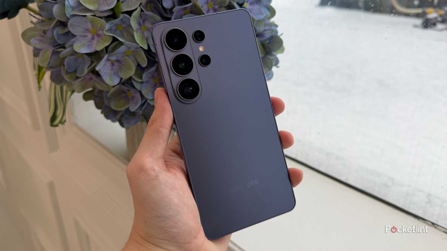 Person holding Samsung Galaxy S26 Ultra.