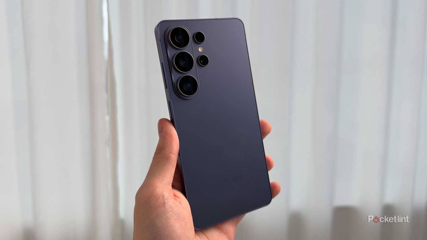 Person holding Galaxy S26 Ultra.