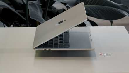 MacBook Air with M5 floating on a white table side view