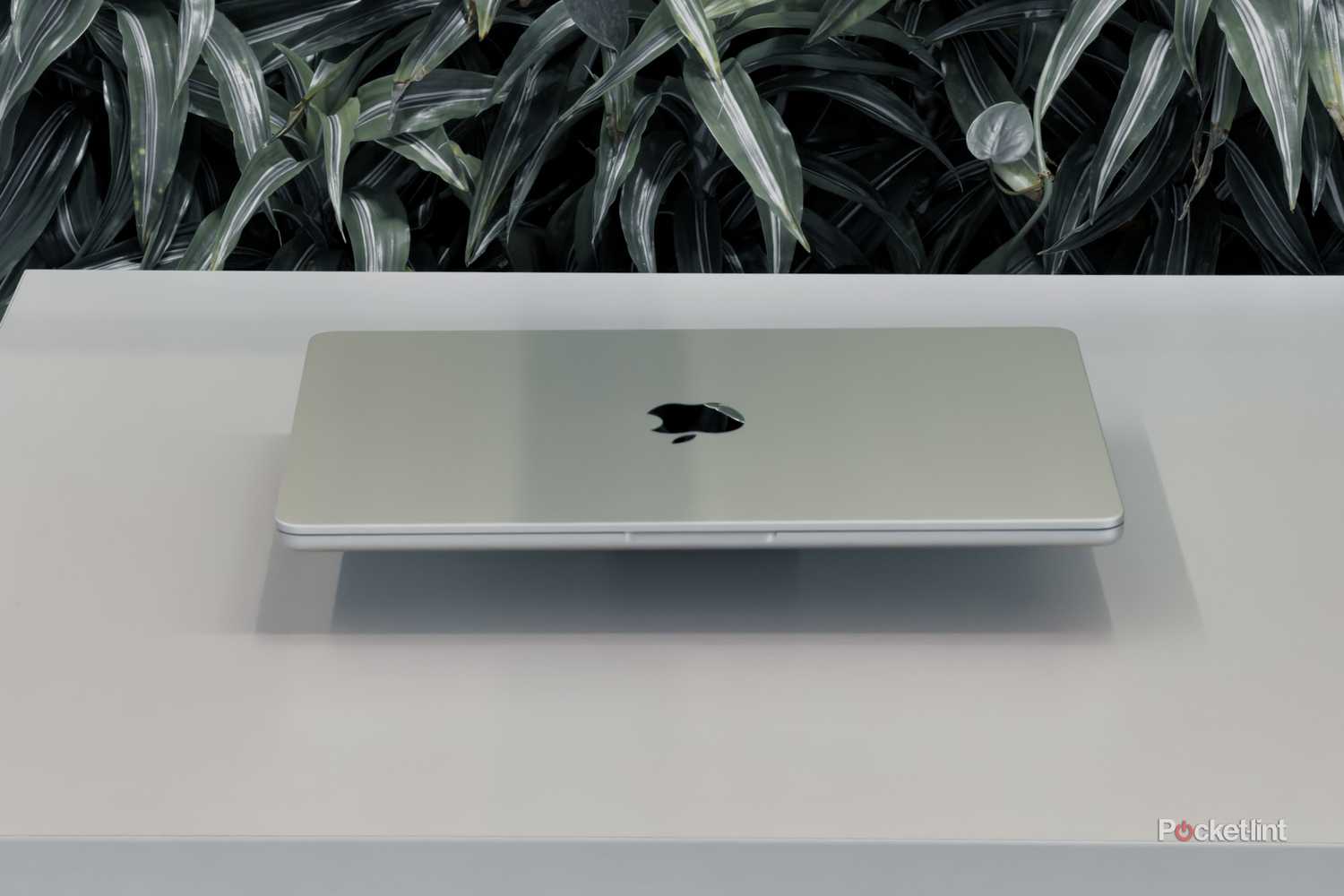 MacBook Air with M5 floating on a white table with lid closed