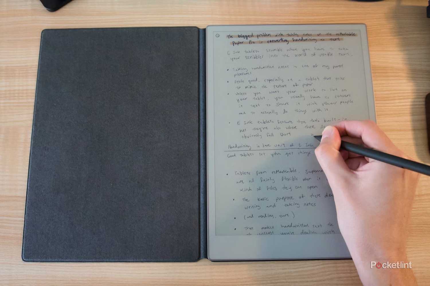 Person using reMarkable tablet.