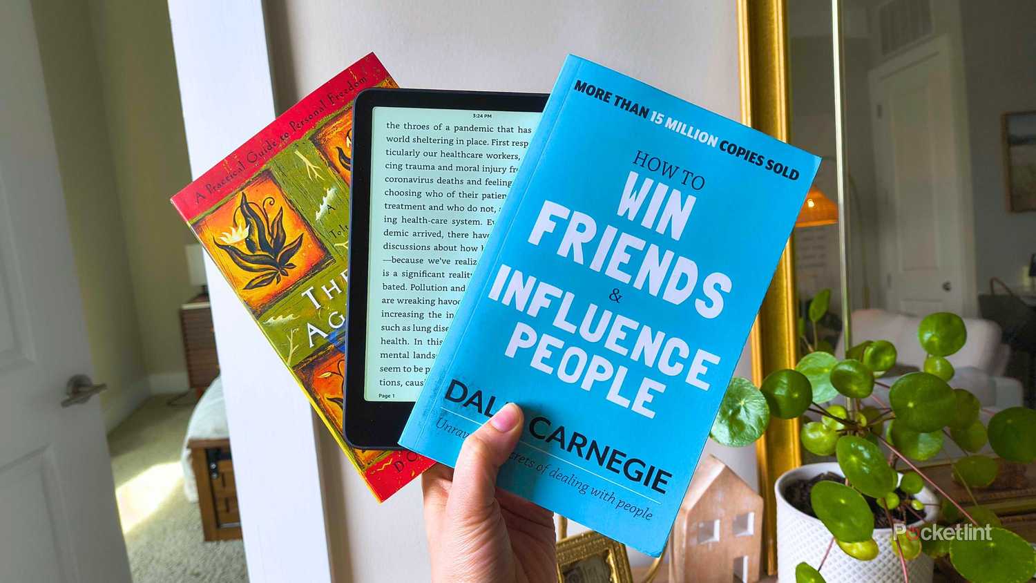 Two books and a Kindle. 