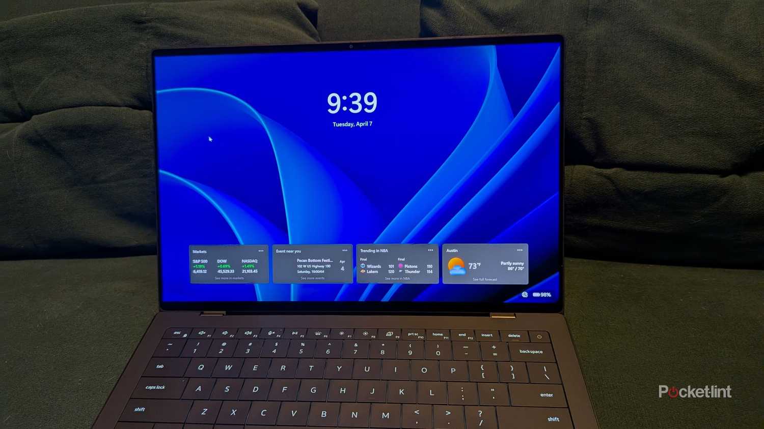 A Dell XPS laptop home screen.