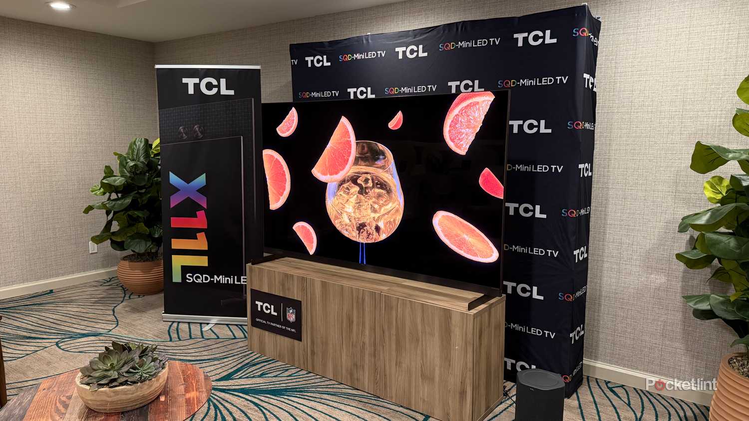 TCL's X11L SQD mini-LED TV in a demo space.