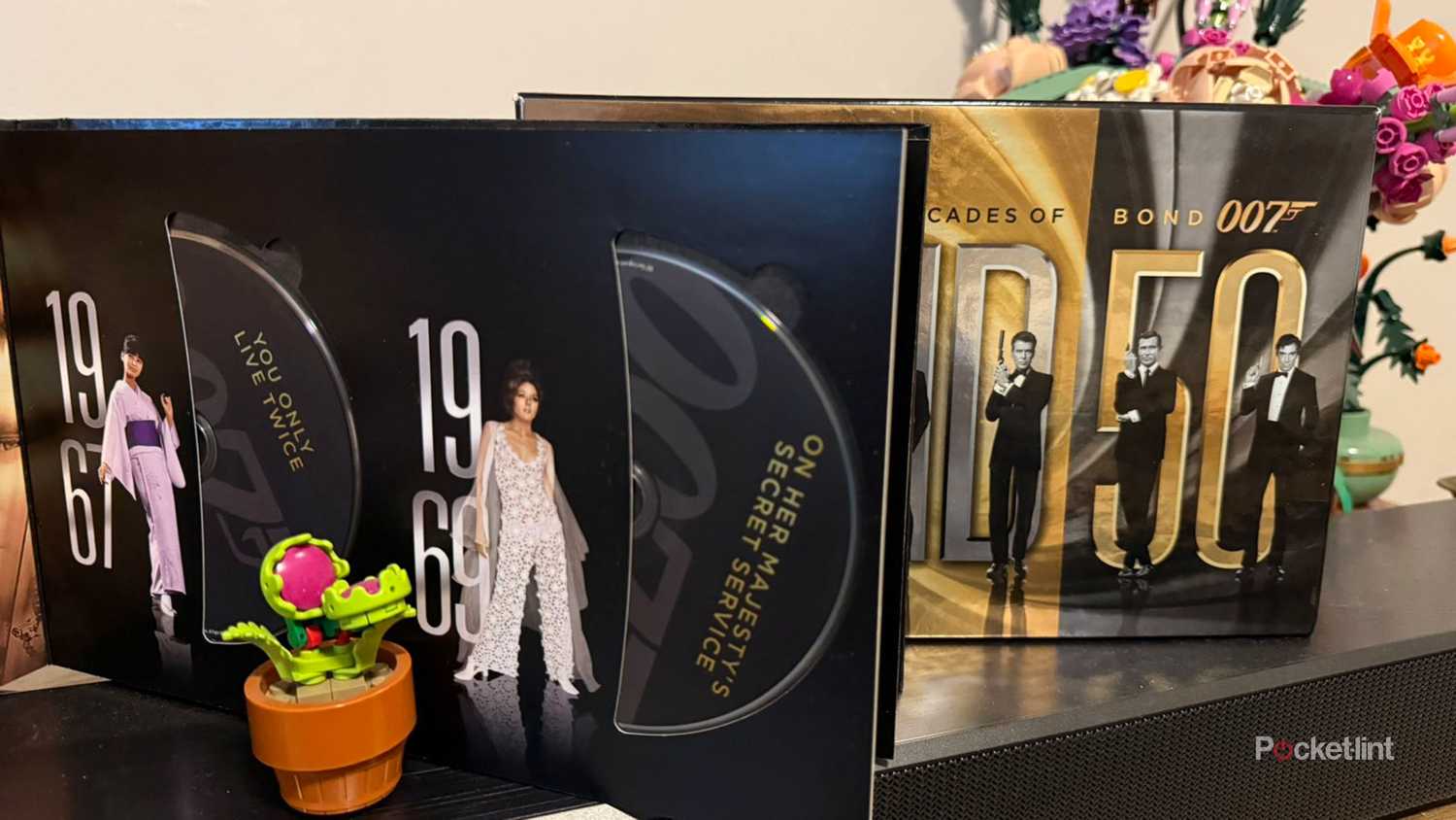 Blu-ray box set of James Bond open to show disc.