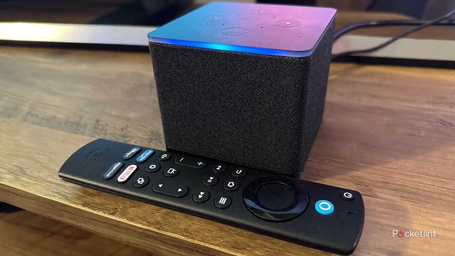 Fire TV Cube on TV unit.