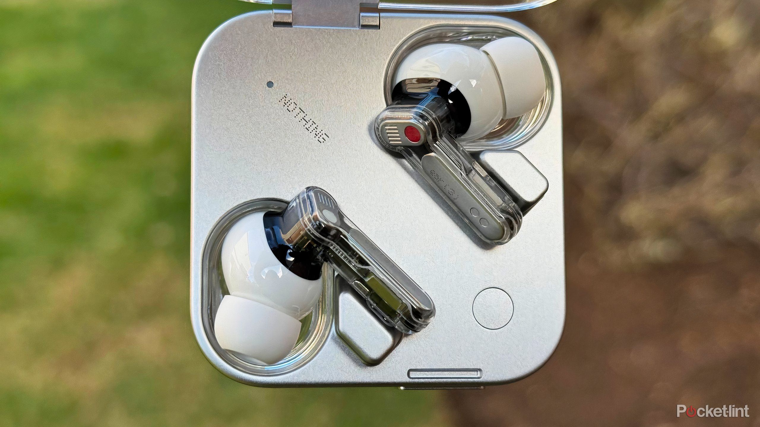 These $180 translucent earbuds have me missing tech’s funky era