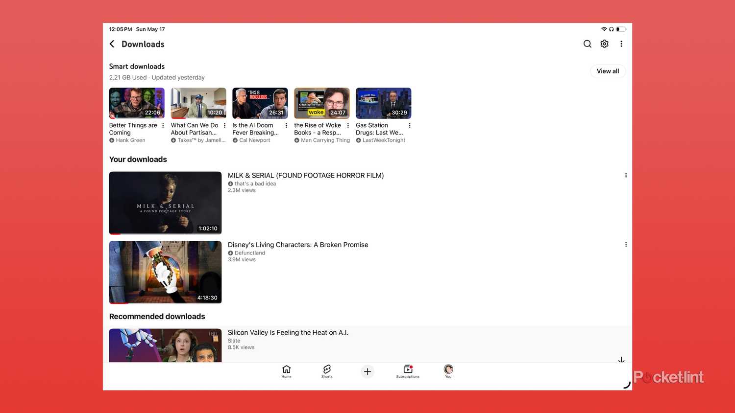 The iPad YouTube interface, showing Smart downloads at the top of the Downloads page.