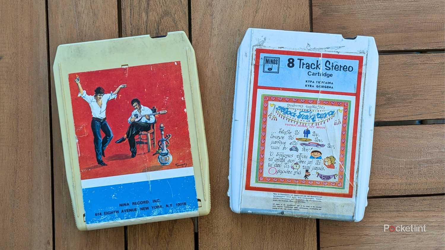 8-track tapes placed on a table.