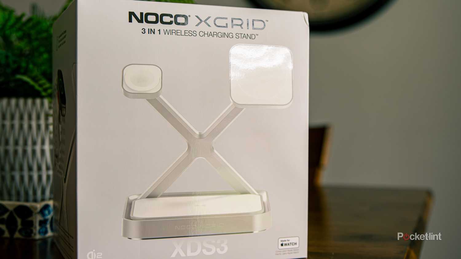 A still photo of the NOCO X-Grid charging tower in its box.