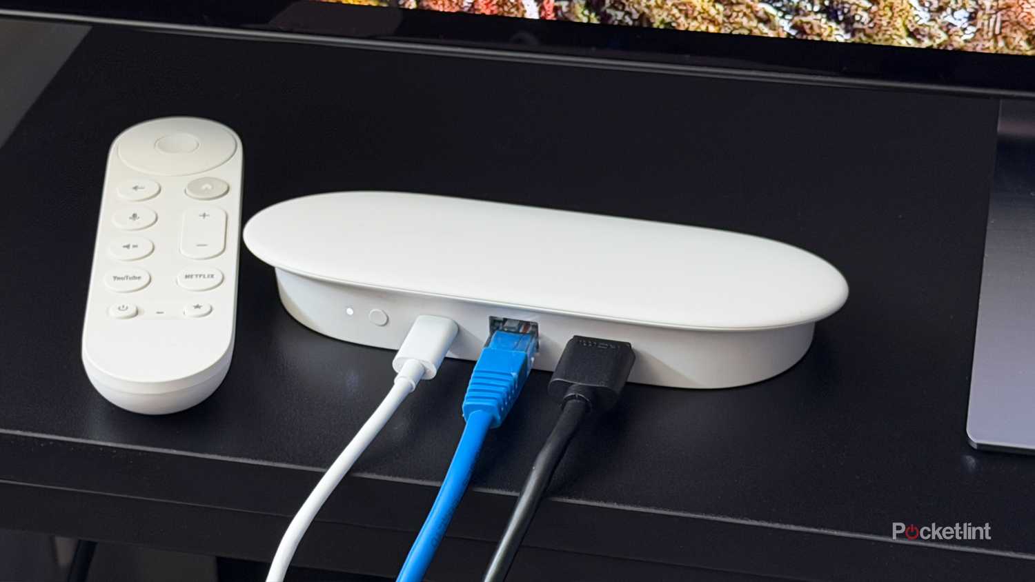 Ethernet cable plugged into Google TV Streamer.