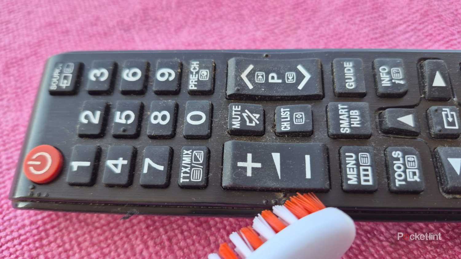 Dirty Samsung TV remote with toothbrush