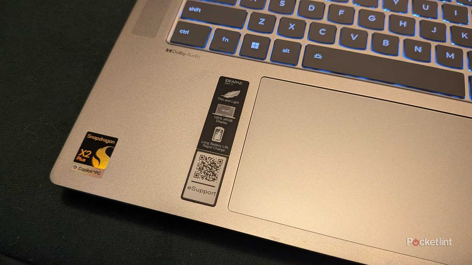 A closeup of the sticker on a Lenovo IdeaPad Slim 5x laptop.