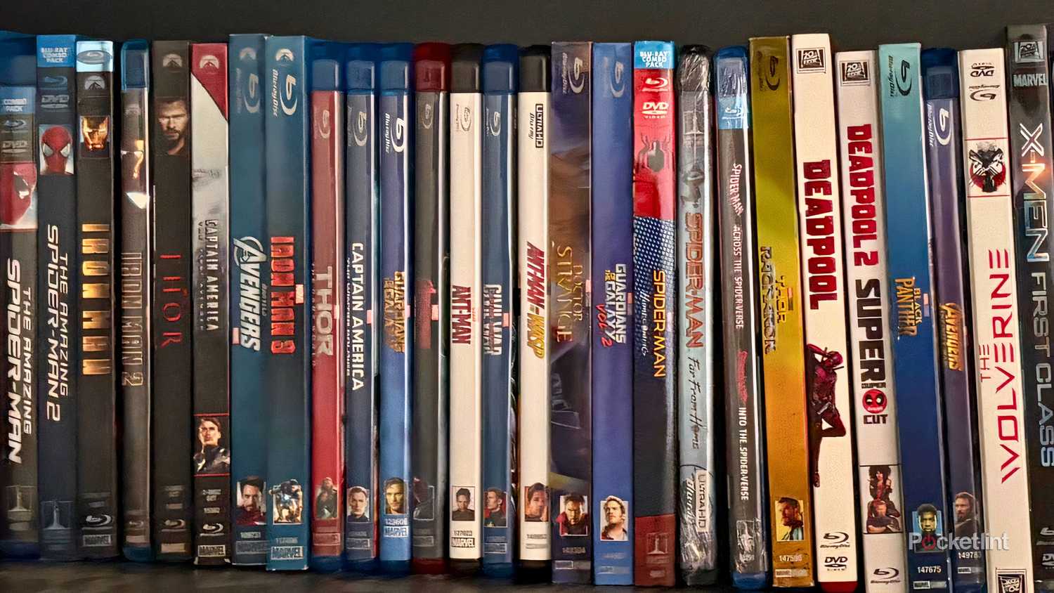 A Blu-ray disc collection displayed on a shelf.