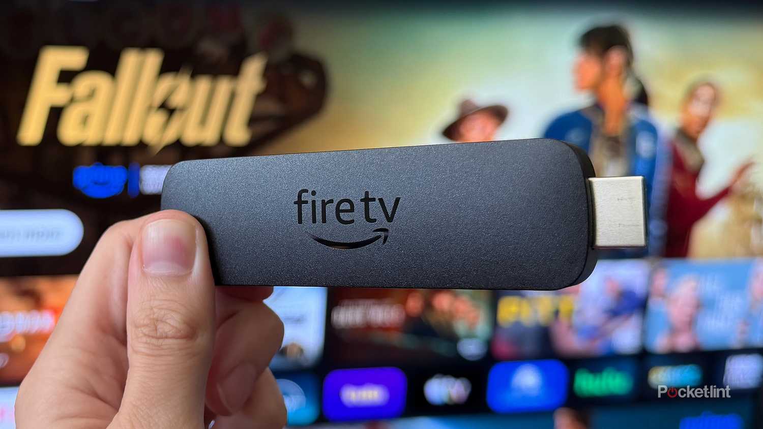 Person holding Fire TV Stick 4K Max.