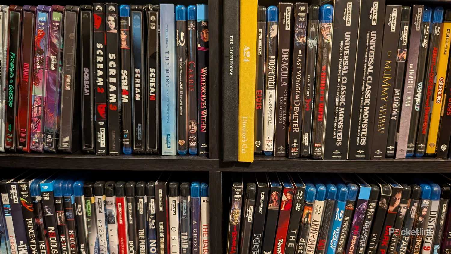 A collection of Blu-ray movies on a shelf.