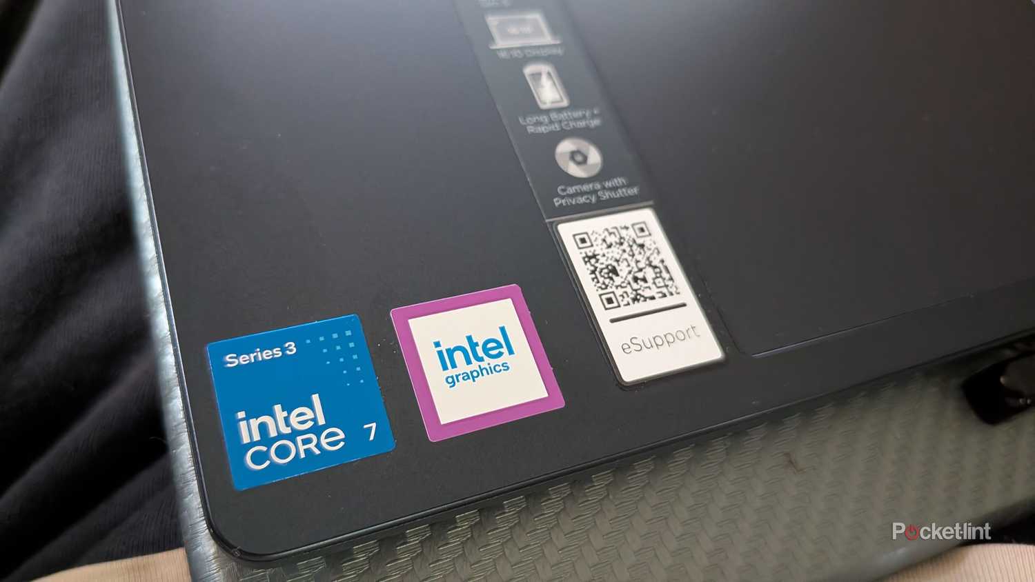 A closeup of the stickers on a Lenovo IdeaPad laptop.