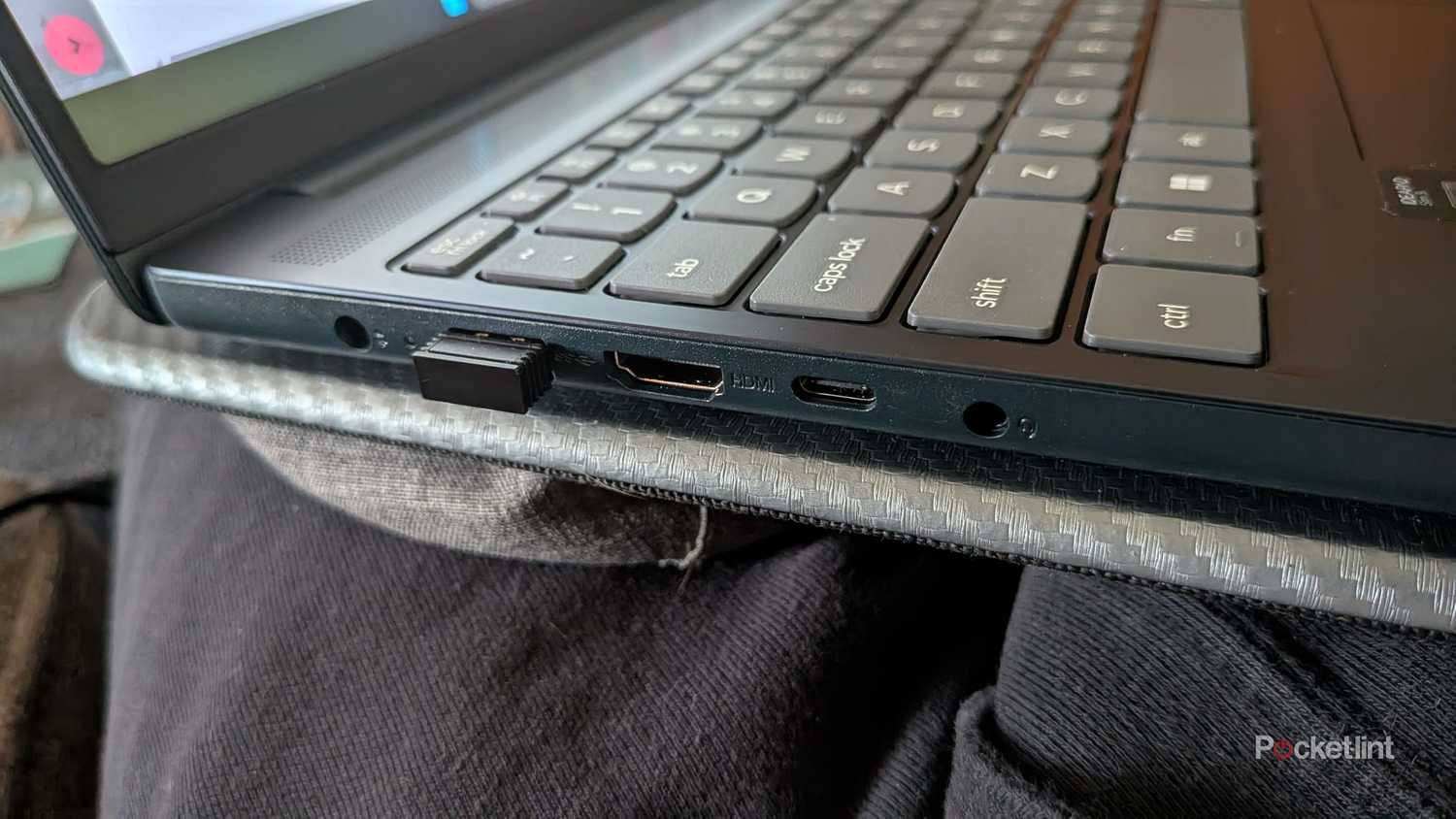 The ports on a Lenovo laptop.