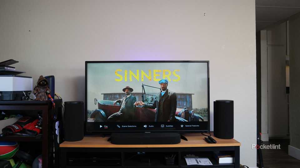 Sony Bravia Theater Trio showing the left and right speakers sitting beyond the edges of the 55" TV