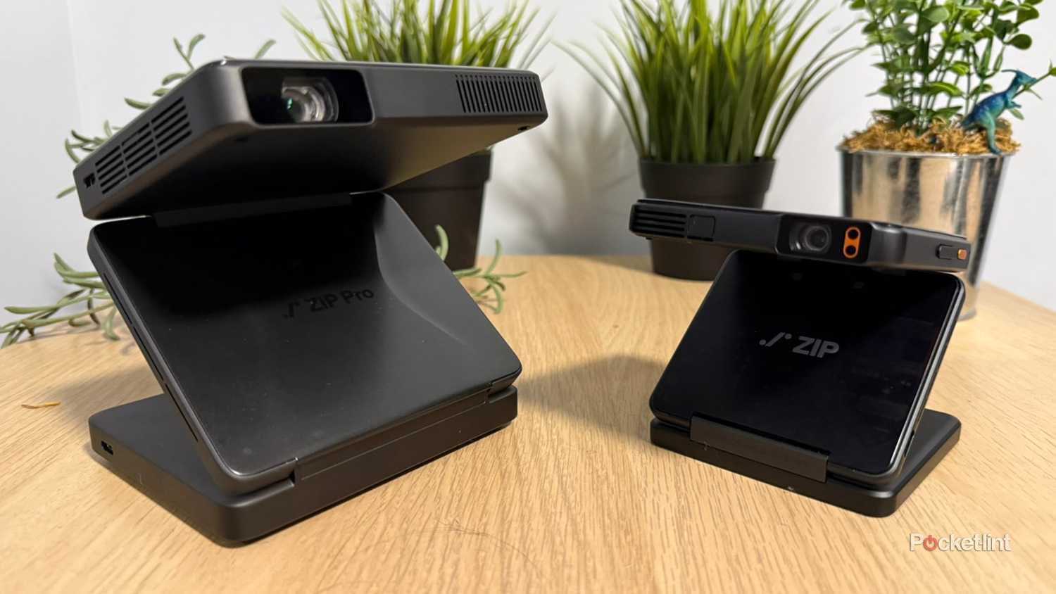 Aurzen Zip Pro Projector next to Aurzen Zip.