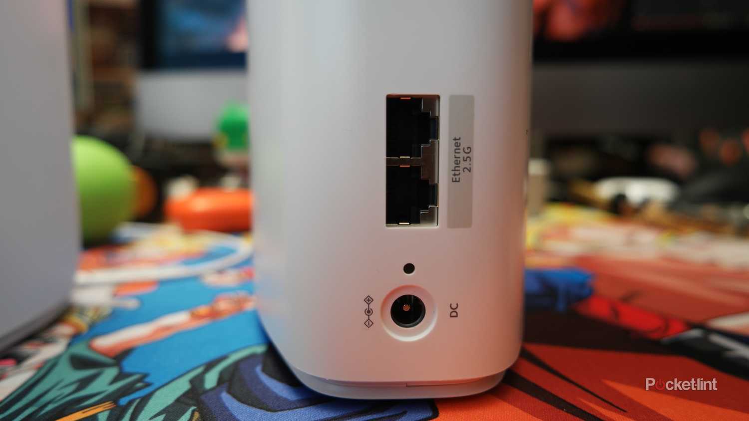 The Orbi 770 on a desk, showing the 2.5GbE and power ports
