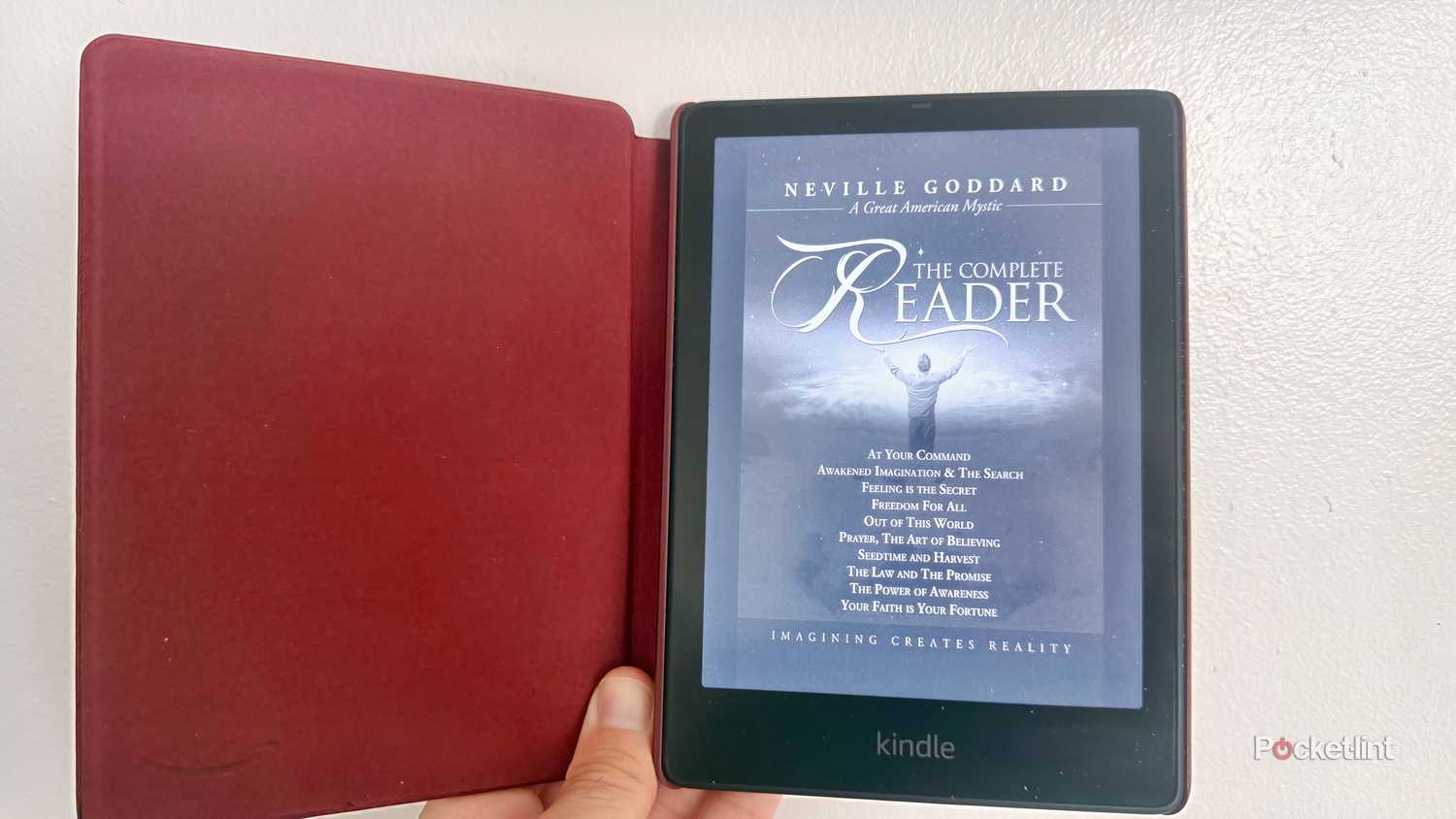 Kindle e-reader displaying Law of Attraction books.