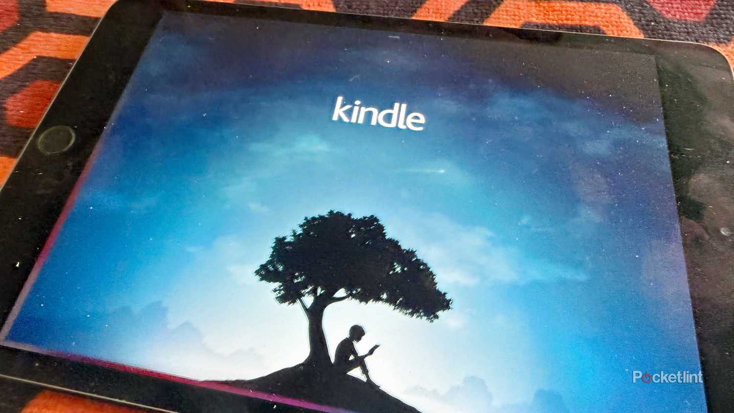 iPad mini displaying Kindle app screen.