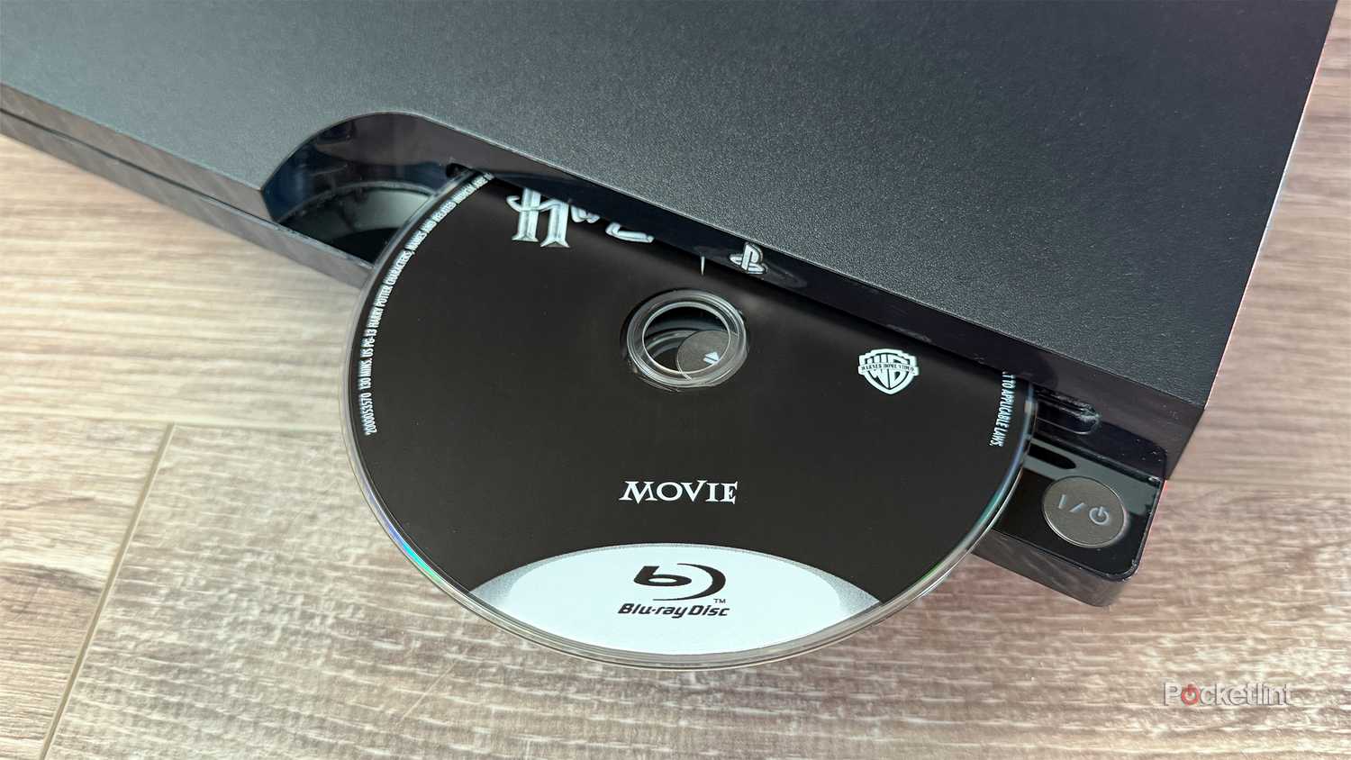 PS3 with Blu-ray disc.