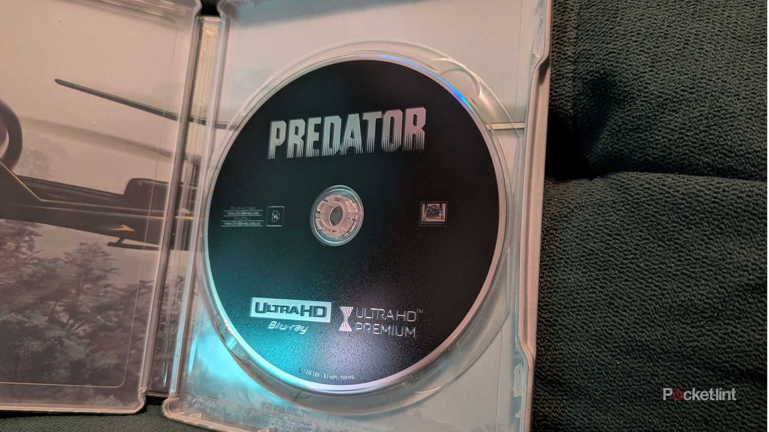The Predator 4K UHD Blu-ray disc sitting in a steelbook.