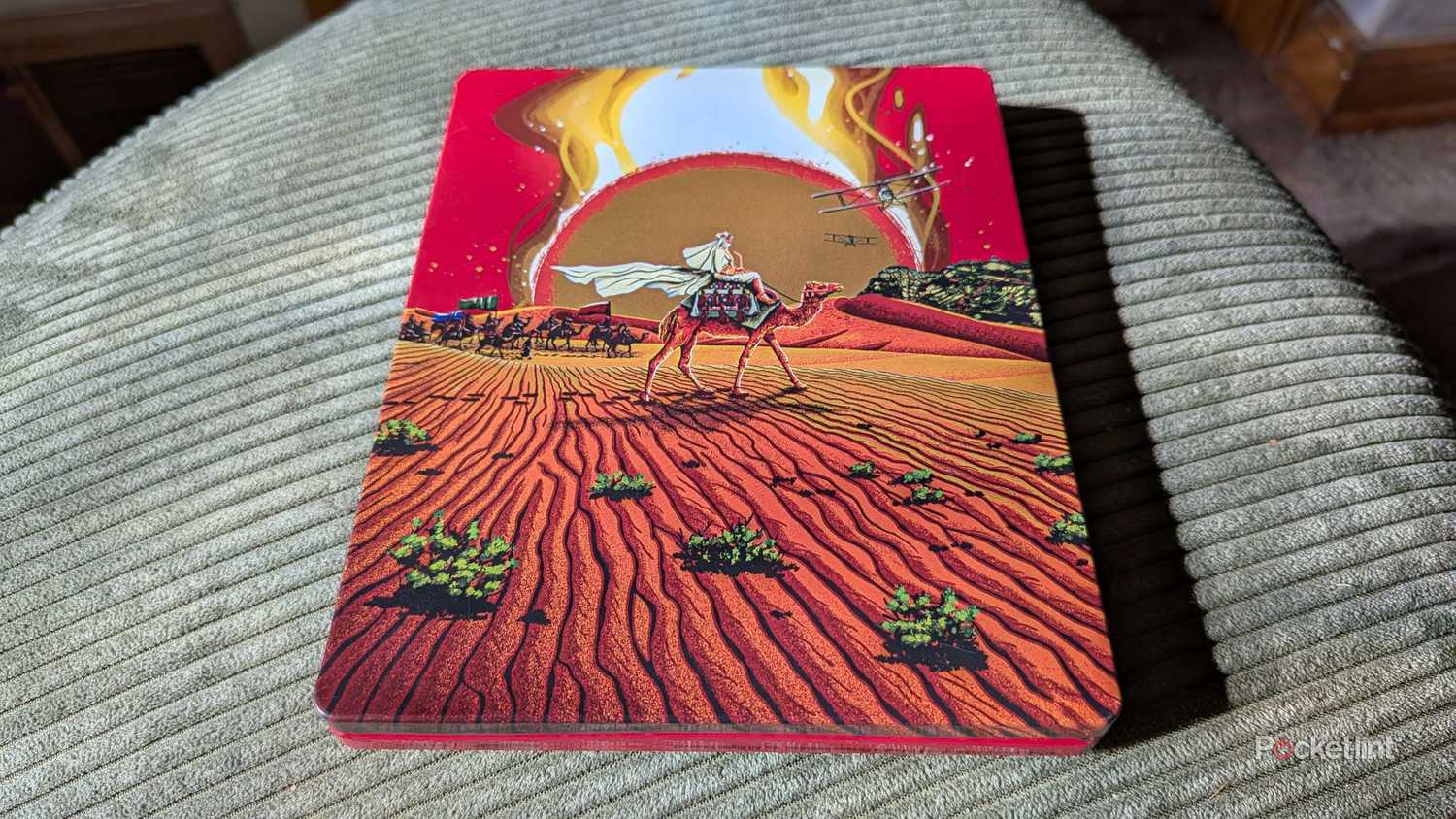 The Lawrence of Arabia 4K steelbook on an ottoman.