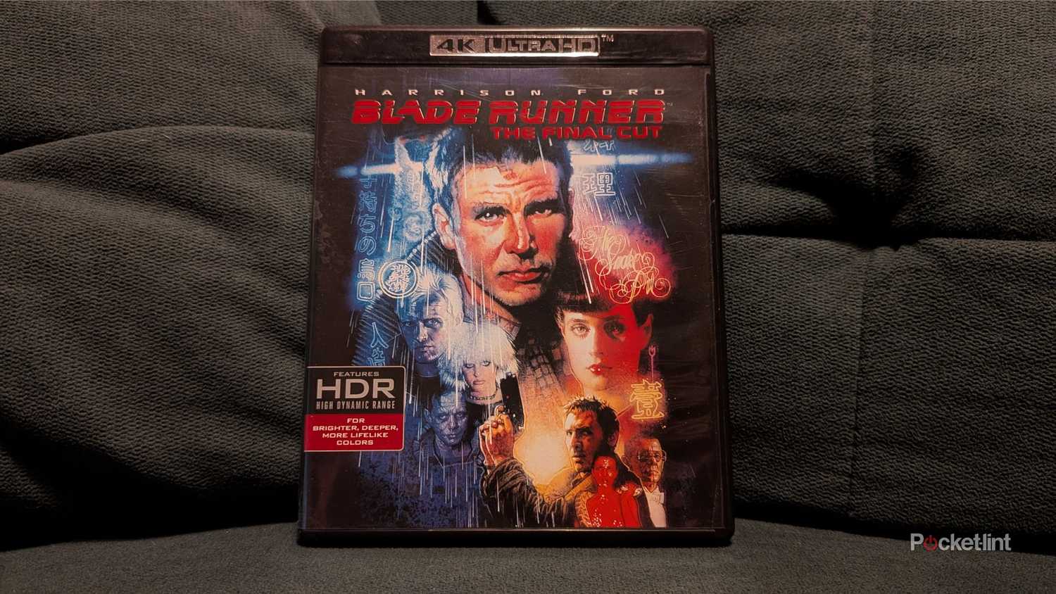 The Blade Runner 4K Blu-ray sitting on a couch.