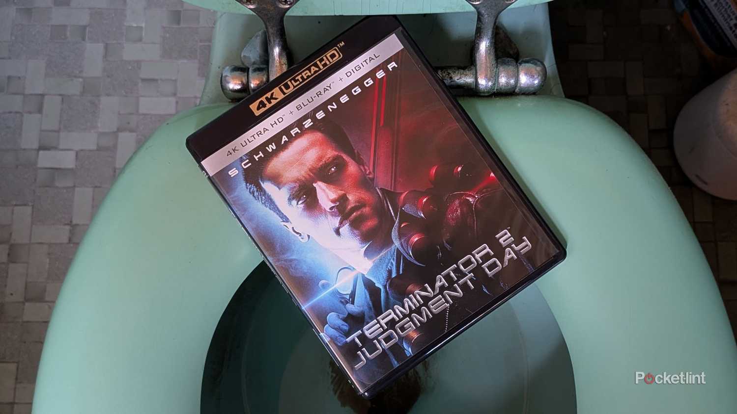 The Terminator 2 4K Blu-ray on a toilet.