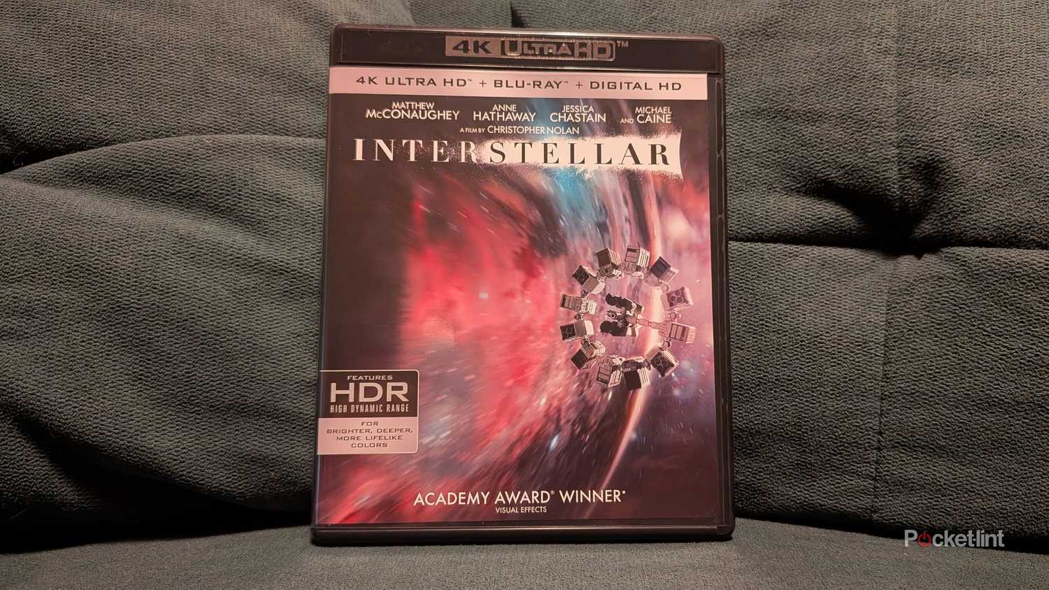 The Interstellar 4K Blu-ray on a couch.