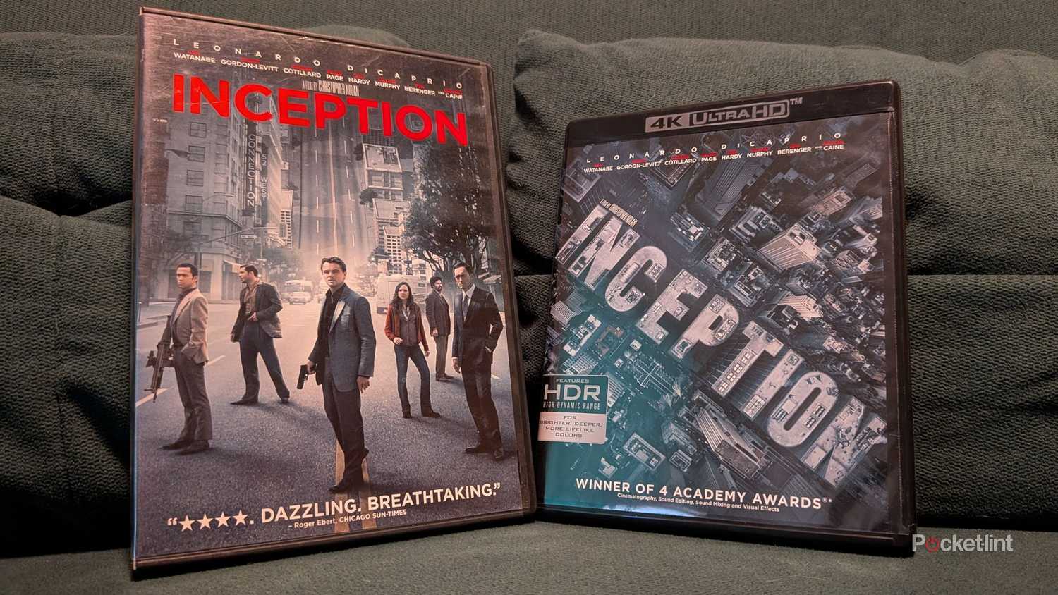 Inception on DVD and 4K Blu-ray on a couch.
