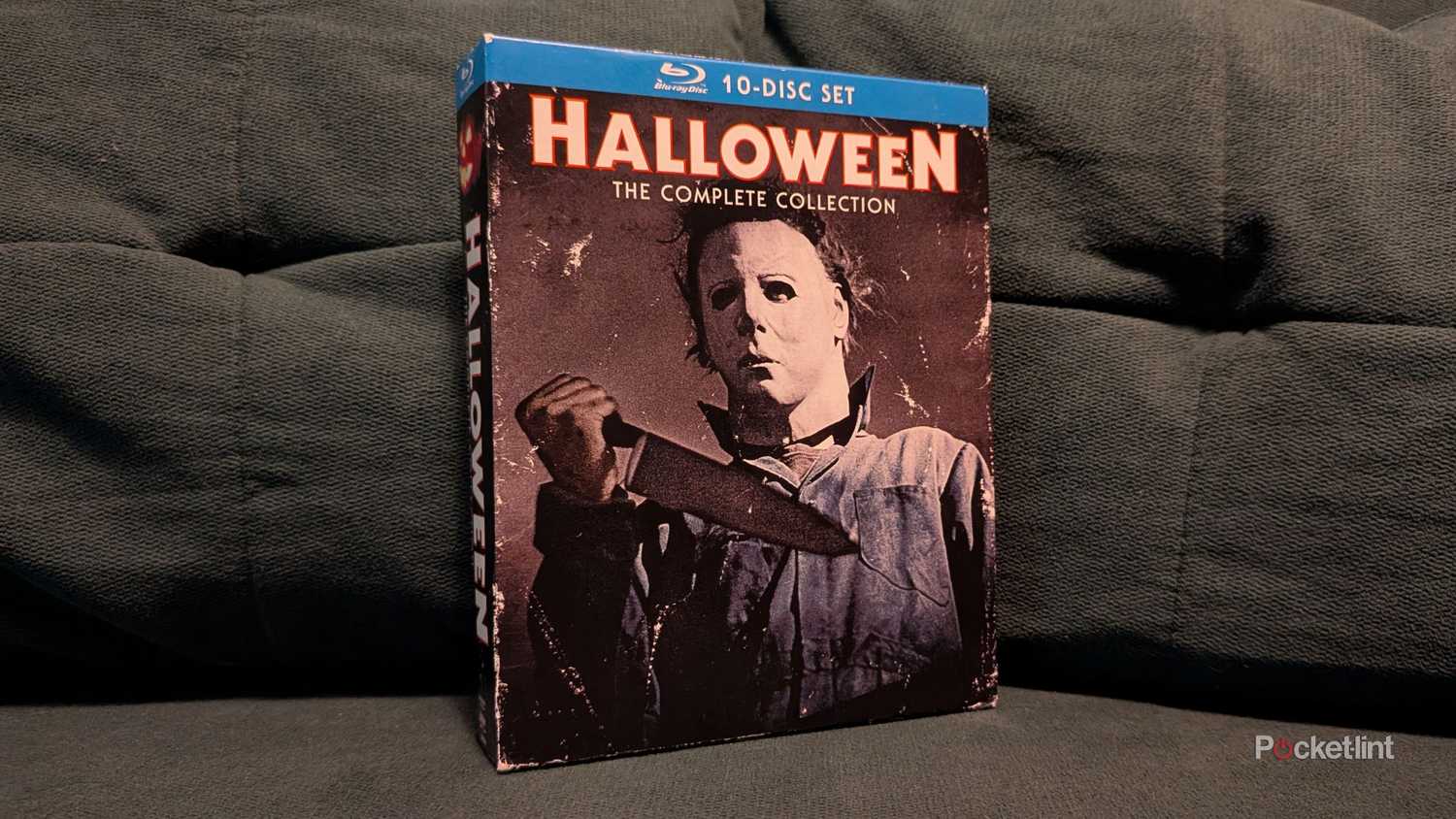 The Halloween Blu-ray box set on a loveseat.