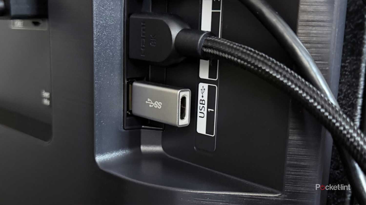TV with USB-C adapter connected.